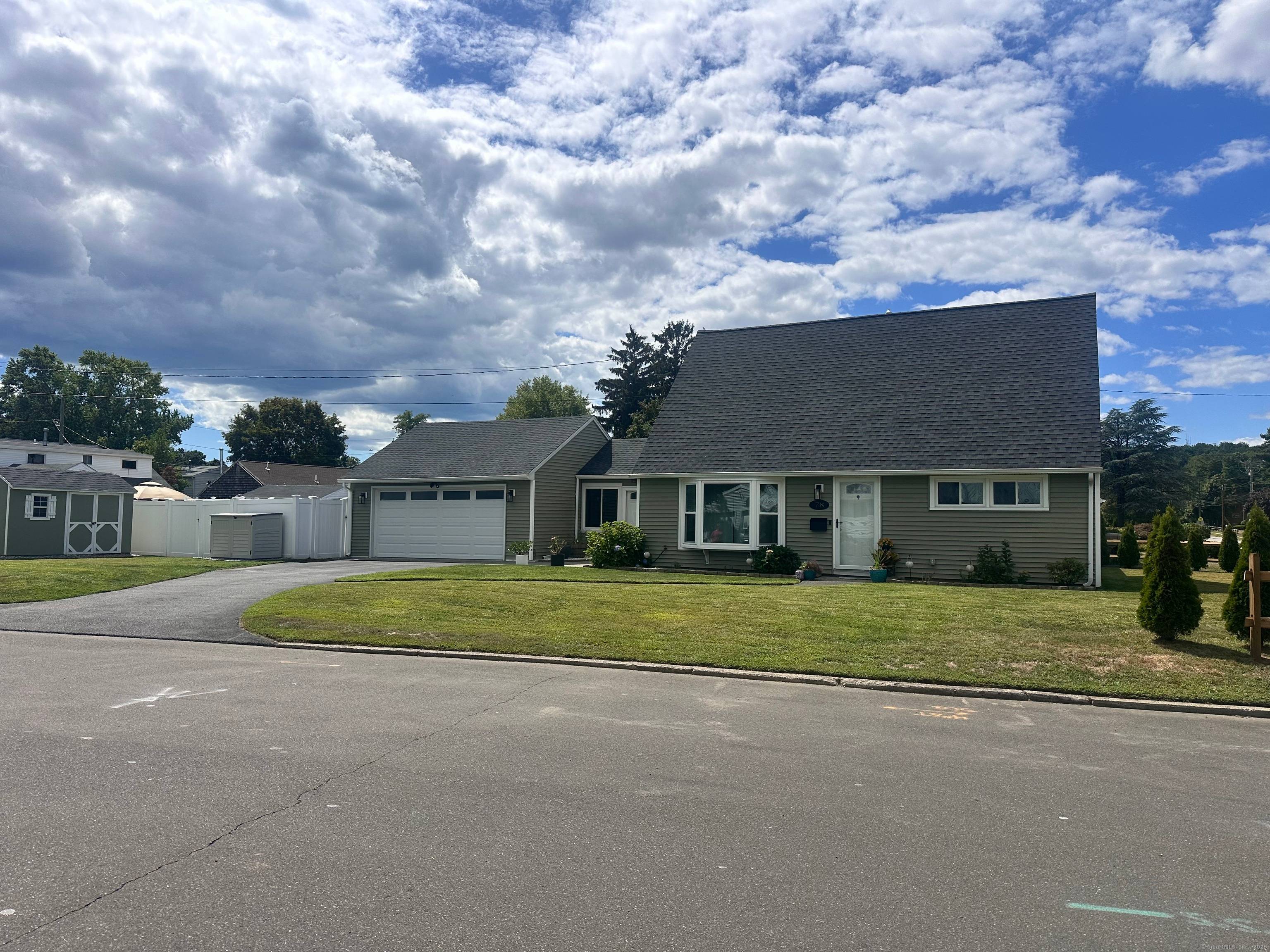 Welcome to this beautifully updated 4 bedroom two full bath Cape located in the sought after Woodmont area of Milford.