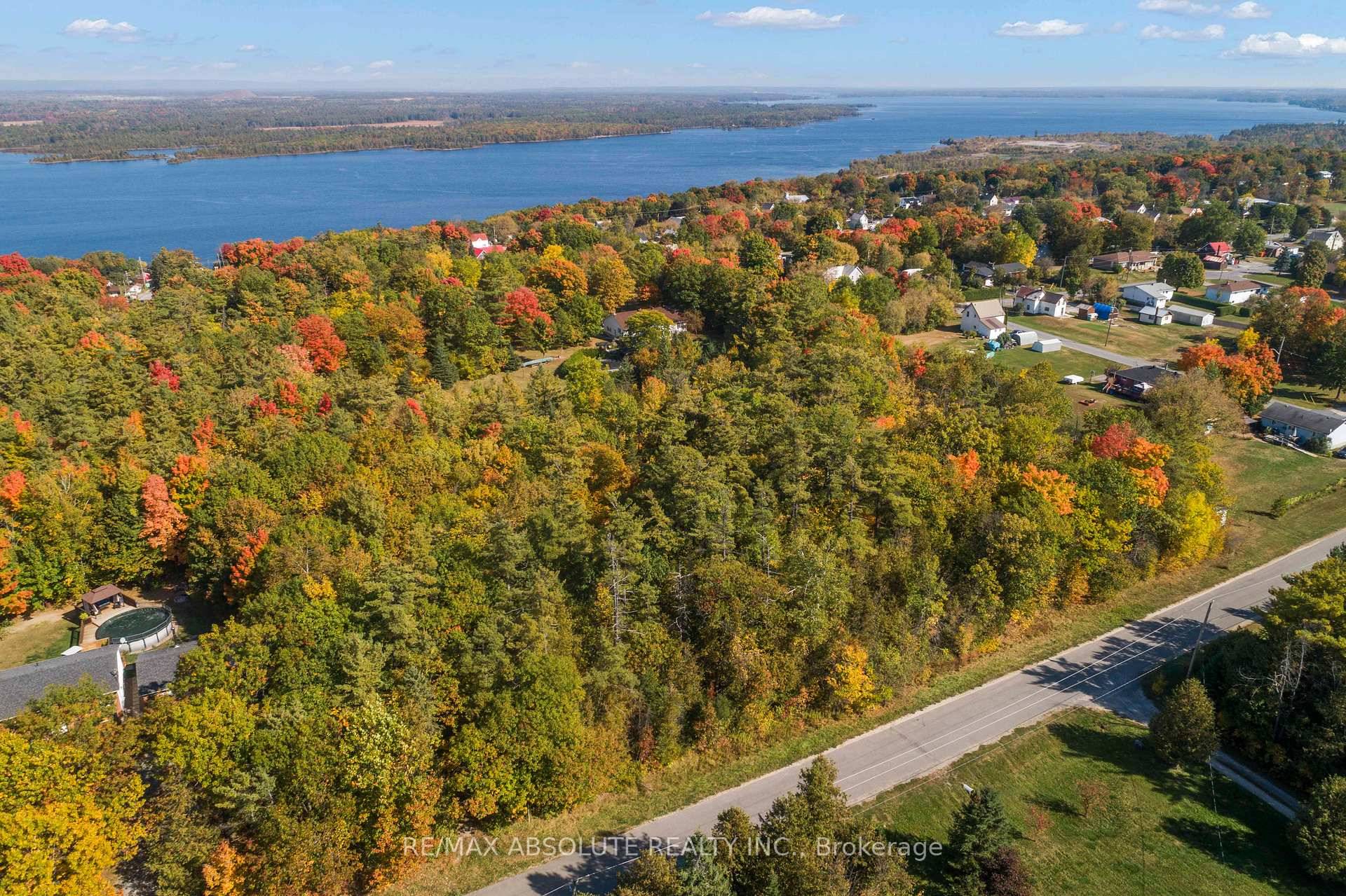 One of two one acre lots side by side on a sought after street in Braeside.