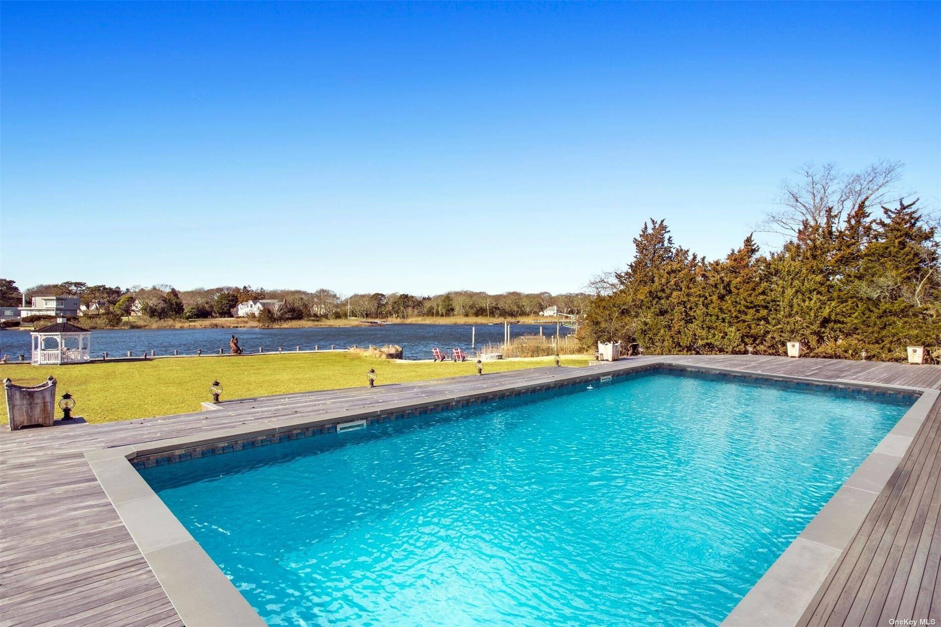 Newly listed summer rental, offering 182 feet of waterfront, including 140 feet bulkhead, and 150 foot deep water dock.