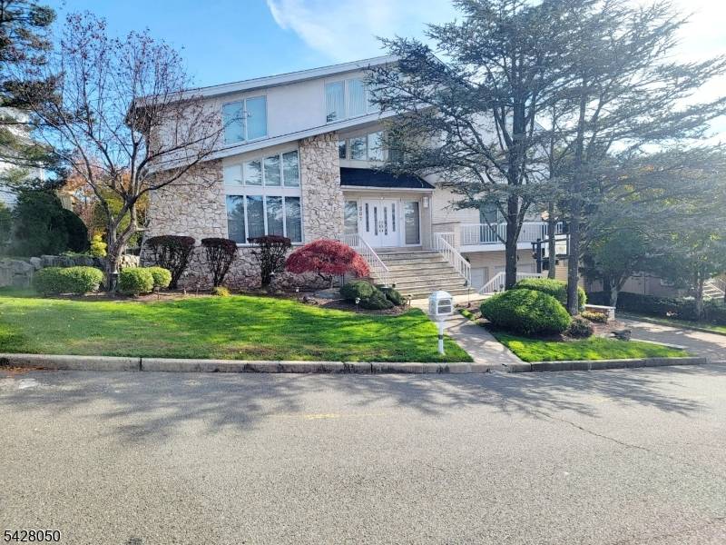 WelcOMe to this Grand 5682 Sq Ft appx home located on Center Street in an desirable, affluent, highly residential area characterized by quiet, tree lined streets in the Borough of ...