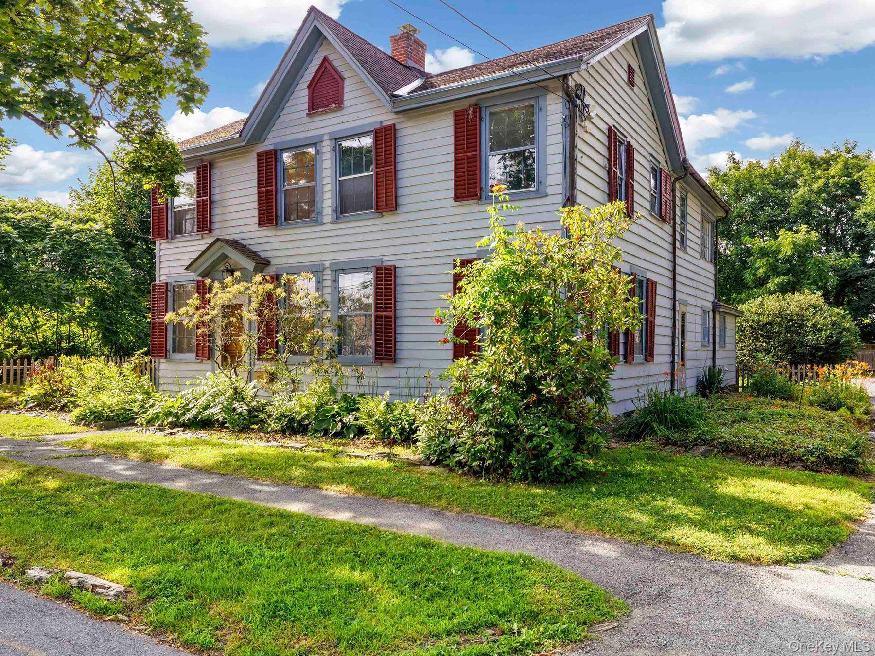 Welcome to the Briggs House, an architecturally rich 4 bedroom, 1.