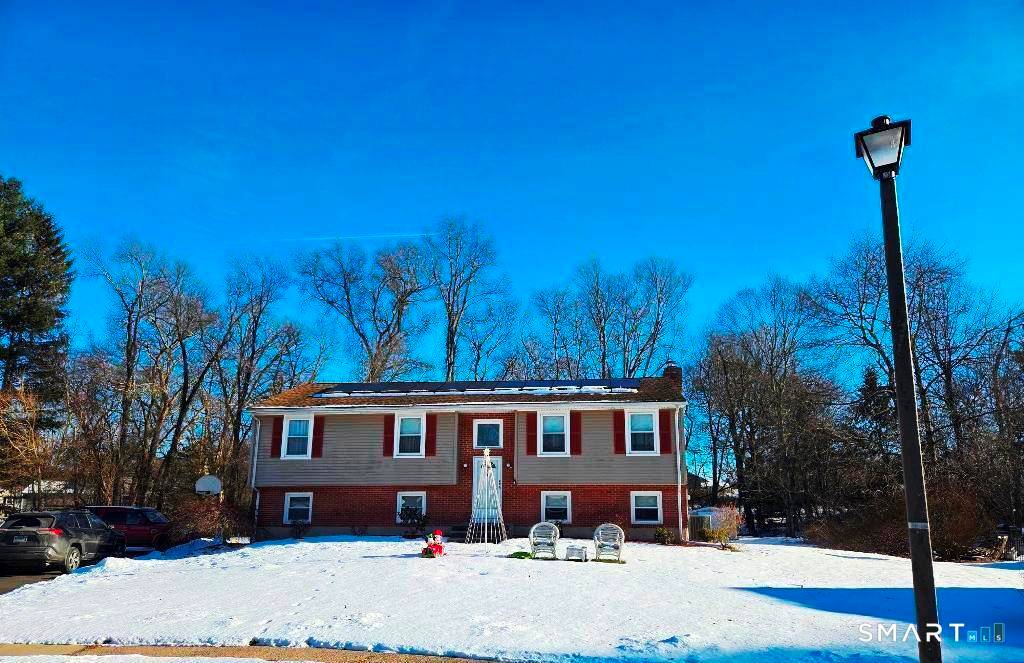 Move right into this nicely maintained Raised Ranch in a desirable neighborhood in Cheshire.