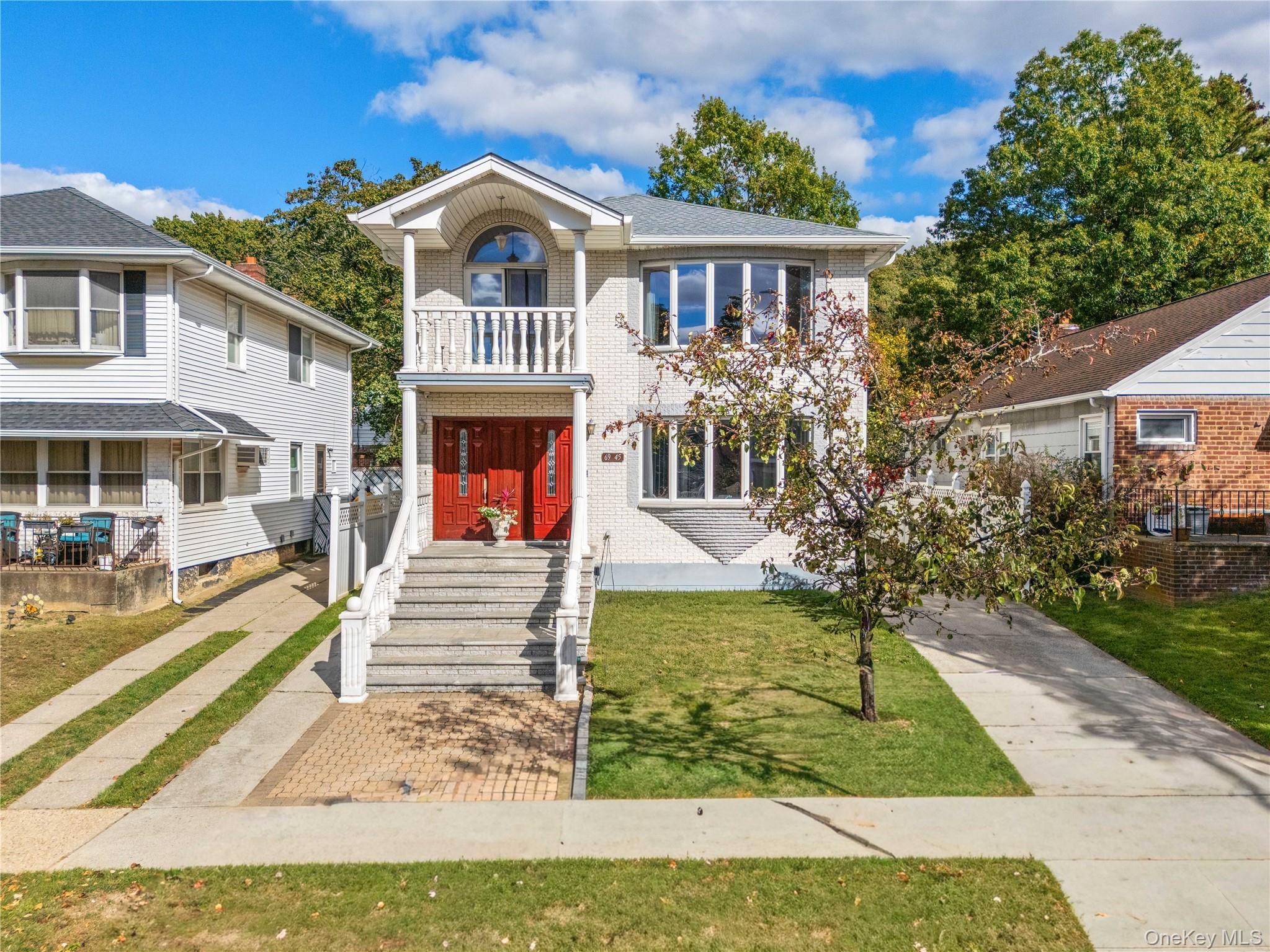 Welcome home to this beautifully updated 3 bedroom, 2 bath apartment located on the second floor of a well maintained two family home in the heart of Oakland Gardens.