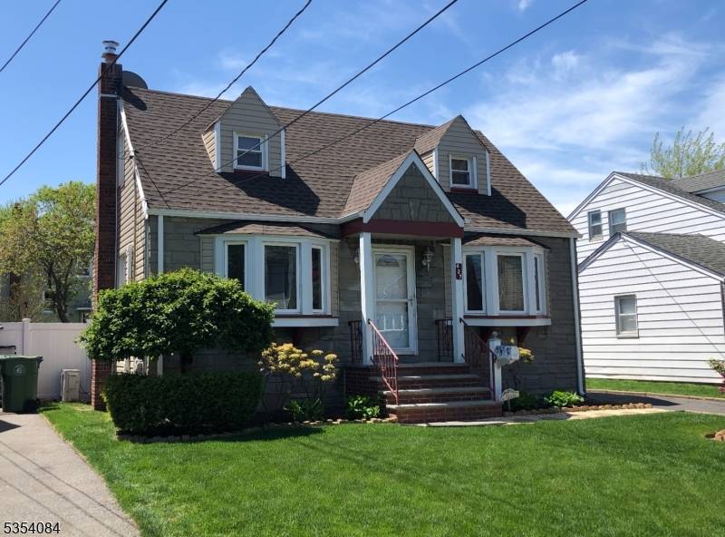 Welcome Home ! Move right into this well maintained, spacious Cape Cod in the heart of the school 8 McManus school district, just 4 blocks away from NYC trains.