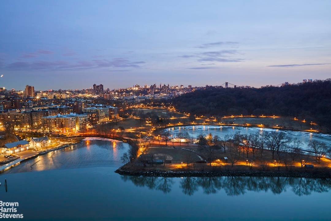 Immerse yourself in spectacular river views from every window of this south and east facing corner two bedroom, two bath apartment, complete with a private terrace.