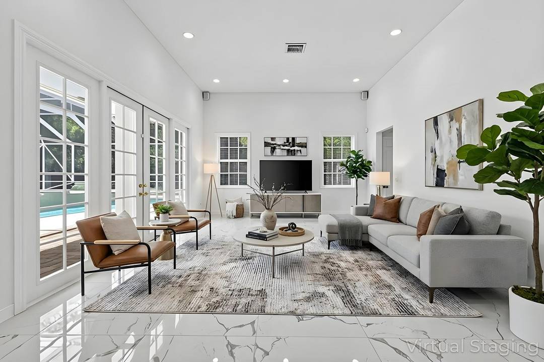 Experience refined living in this luxury estate in Wellington, just minutes from the Winter Equestrian Festival.