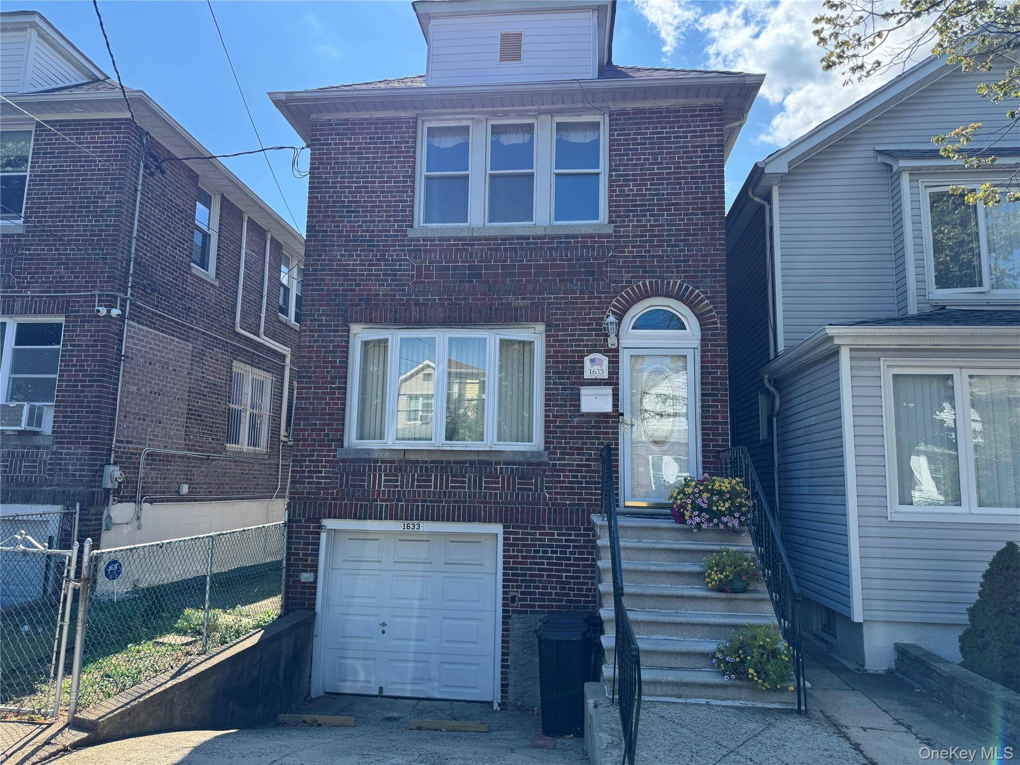 CHARMING TWO STORY HOME IN A PRIME LOCATION Welcome to this well maintained, bright and sunny, character filled two story detached brick home with driveway and a garage.