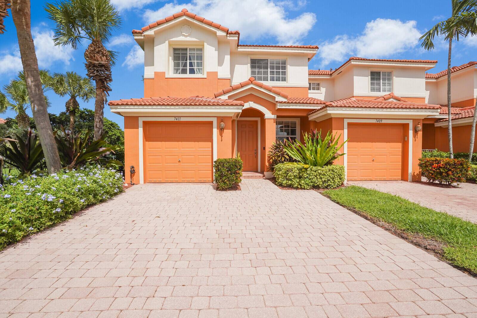 65279 ; Experience lakefront living at its finest in the exceptional end unit townhouse with tranquil lake views located within the sought after community of Briella in Boynton Beach.
