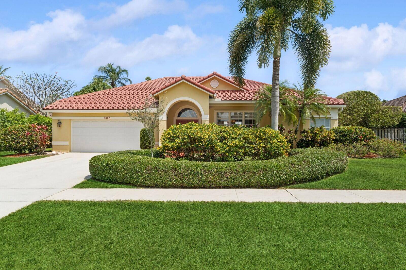 Discover this well maintained 4BR 2BA 2CG one level pool home in the heart of Wellington w no HOA !