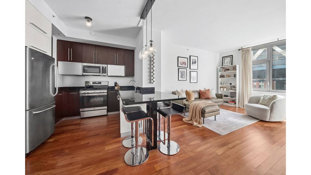 Welcome to Unit 7K at J Condo a modern one bedroom retreat with expansive light and refined style in the heart of DUMBO.