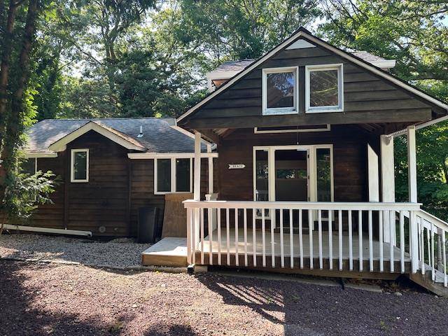 Welcome home to this charming and private retreat on Cedar Drive in Miller Place !