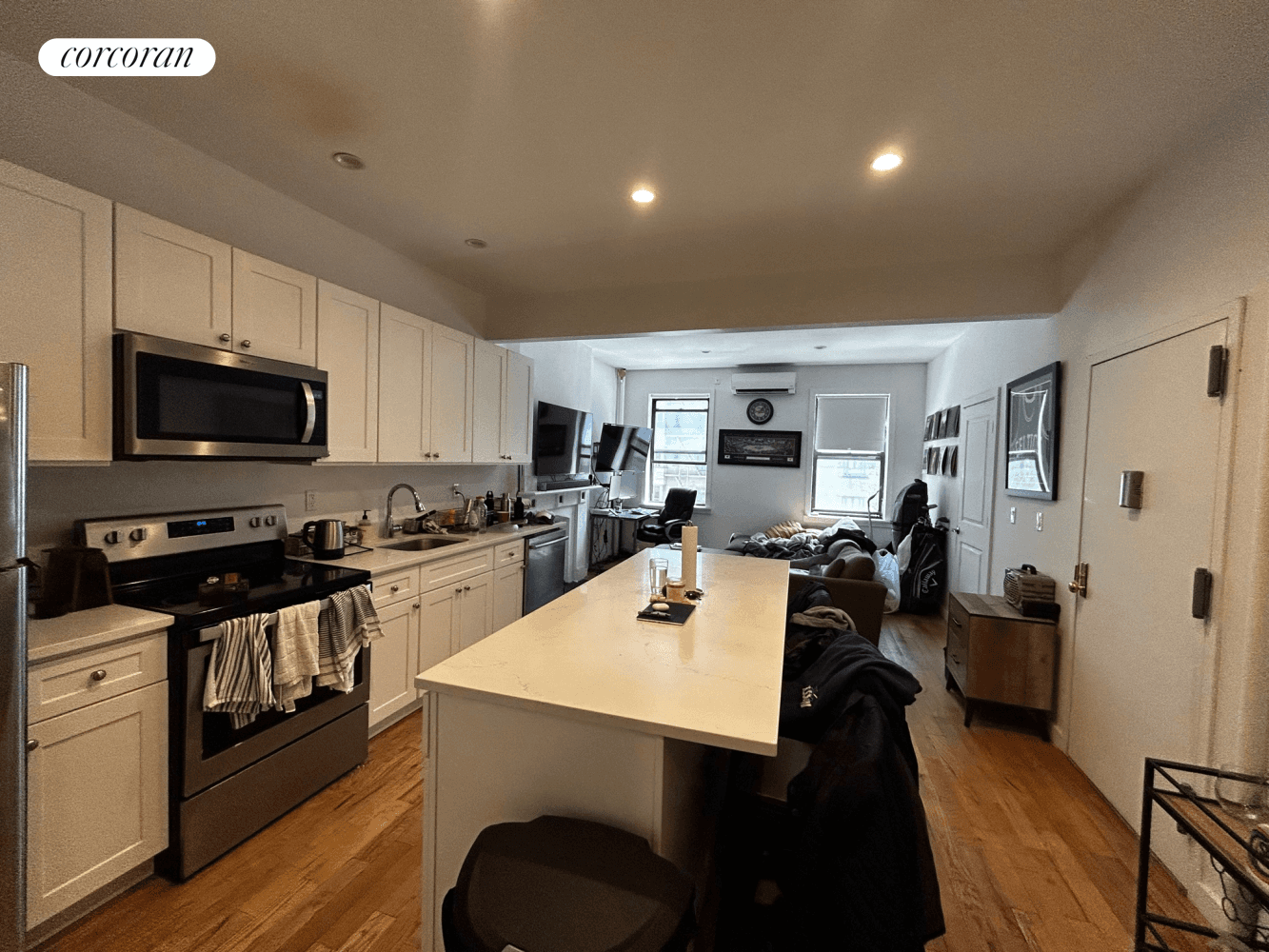 Sun Drenched and Spacious 3 Bedroom in Prime Time ChelseaApartment Features Washer dryer in unit Central AC Spacious and versatile living space with enough room for a couch, TV, coffee ...
