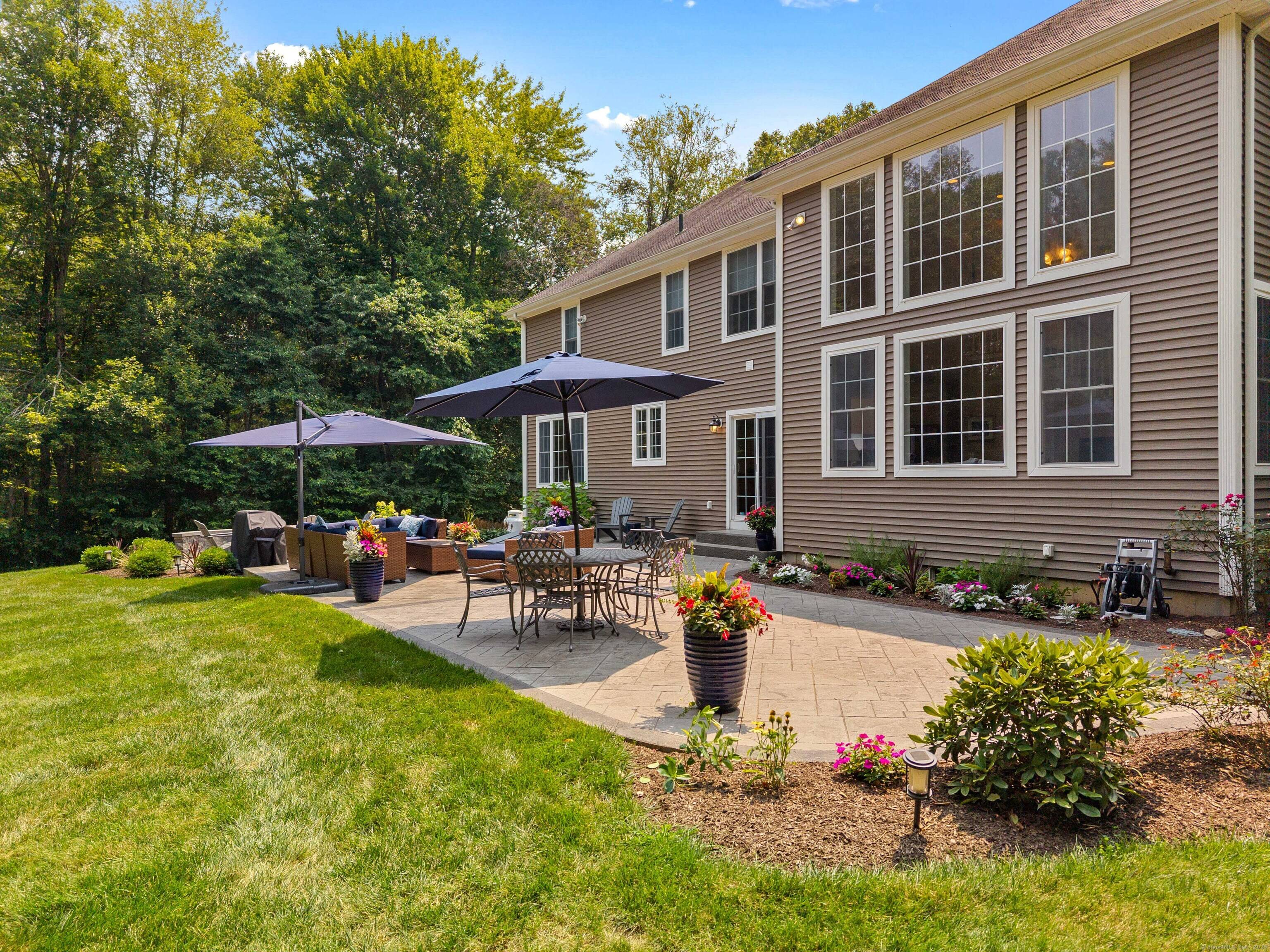 Welcome to 15 Harvest Glen, a stunning residence in one of East Lyme's most desirable neighborhoods.