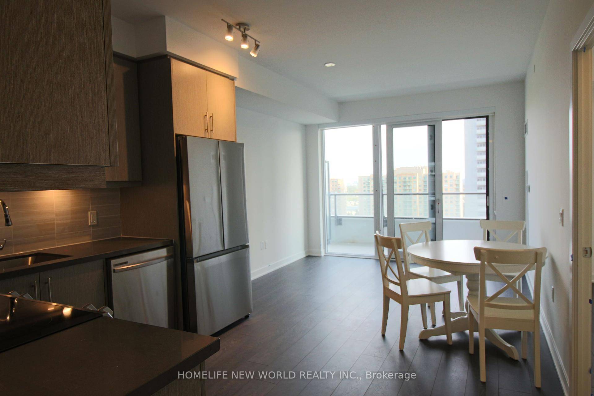 Like new, sun filled, south facing, Floor to ceiling wall to wall windows in living room and bedroom.