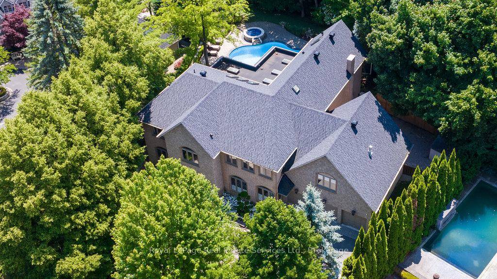 Stately residence at the bottom of an exclusive cul de sac, one house away from the Lake and steps to Downtown Oakville.