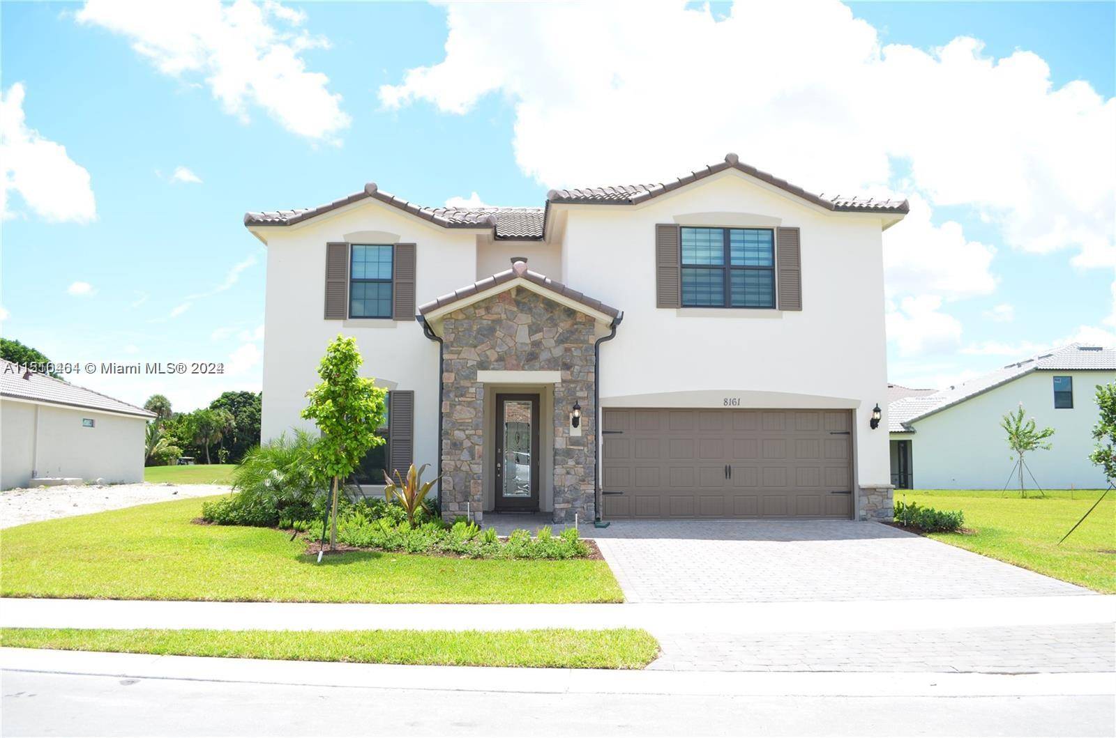 2855 sqft Living Area ! One of the largest lots in The Enclaves at Woodmont !