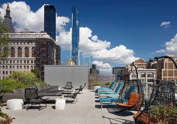 Spacious one bedroom featuring a flexible layout with space for a dedicate dining or home office nook, gourmet kitchen with stainless steel appliances, quartz countertops and eating bar, an in ...