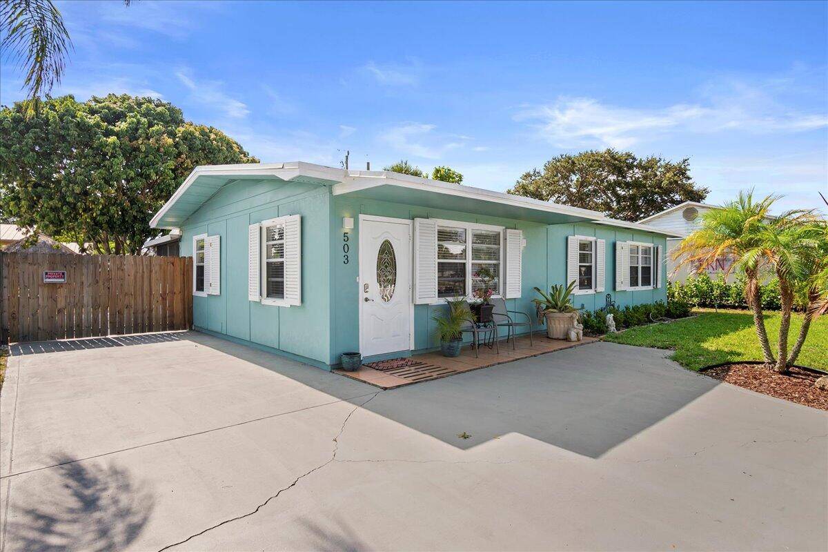 Elegant and spacious remodeled 3 bedroom 2 bath house with private fenced back yard right off the main road in central Jupiter.