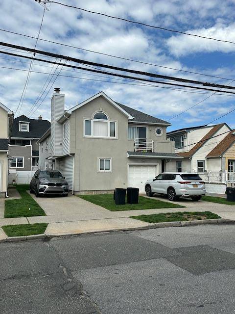 Legal Two Family Home, in the Heart of Long Beach, offering everything you could want in a coastal residence bright and open layout, down the block from the boardwalk and ...