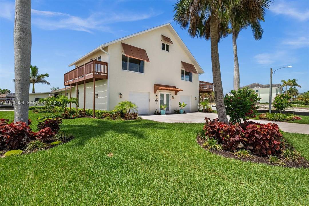 Experience the best of Florida waterfront living at 4837 Tarpon Ave !