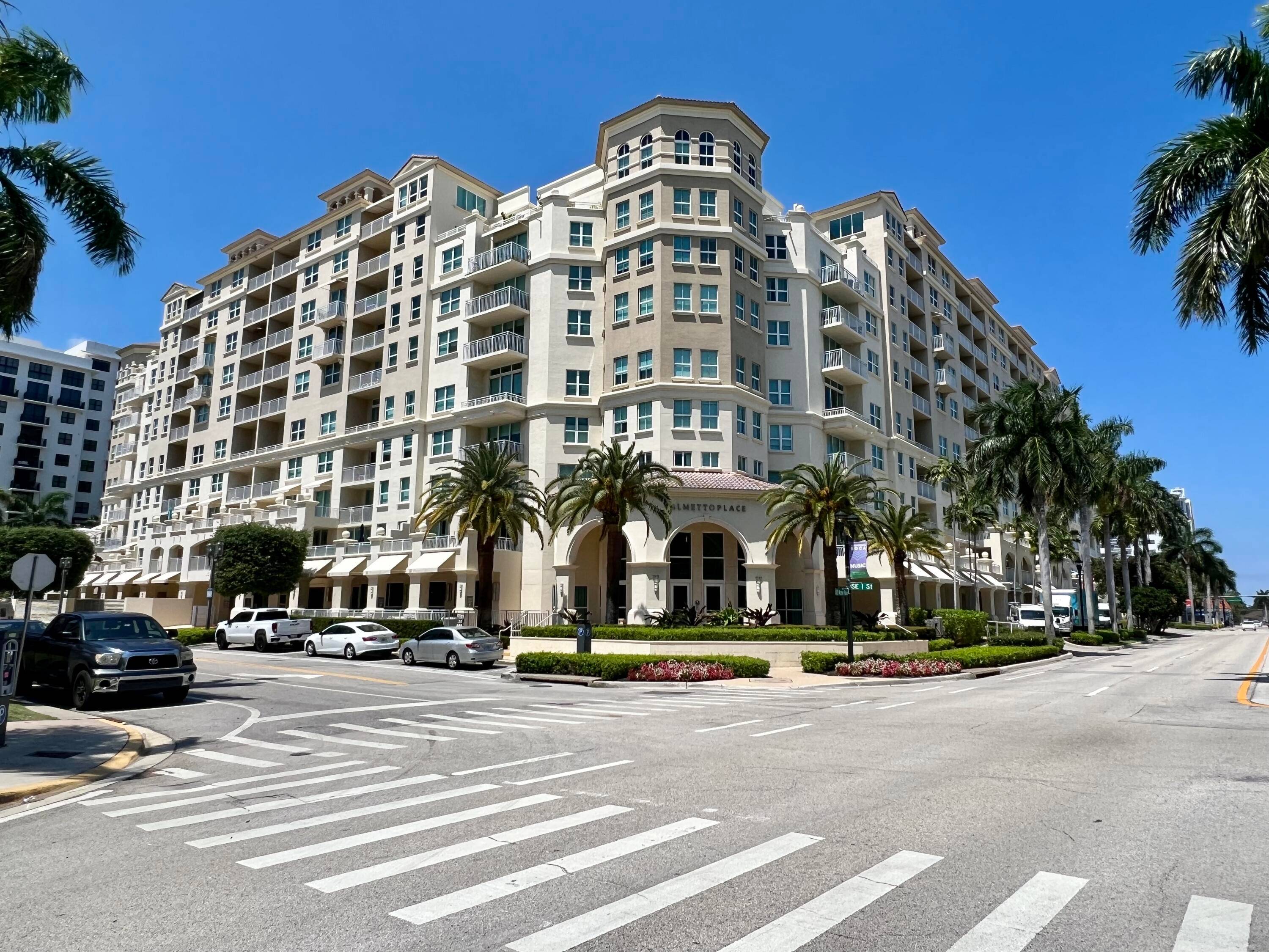 Welcome to Unit 233 at the prestigious Palmetto Place, where sophistication meets South Florida charm.