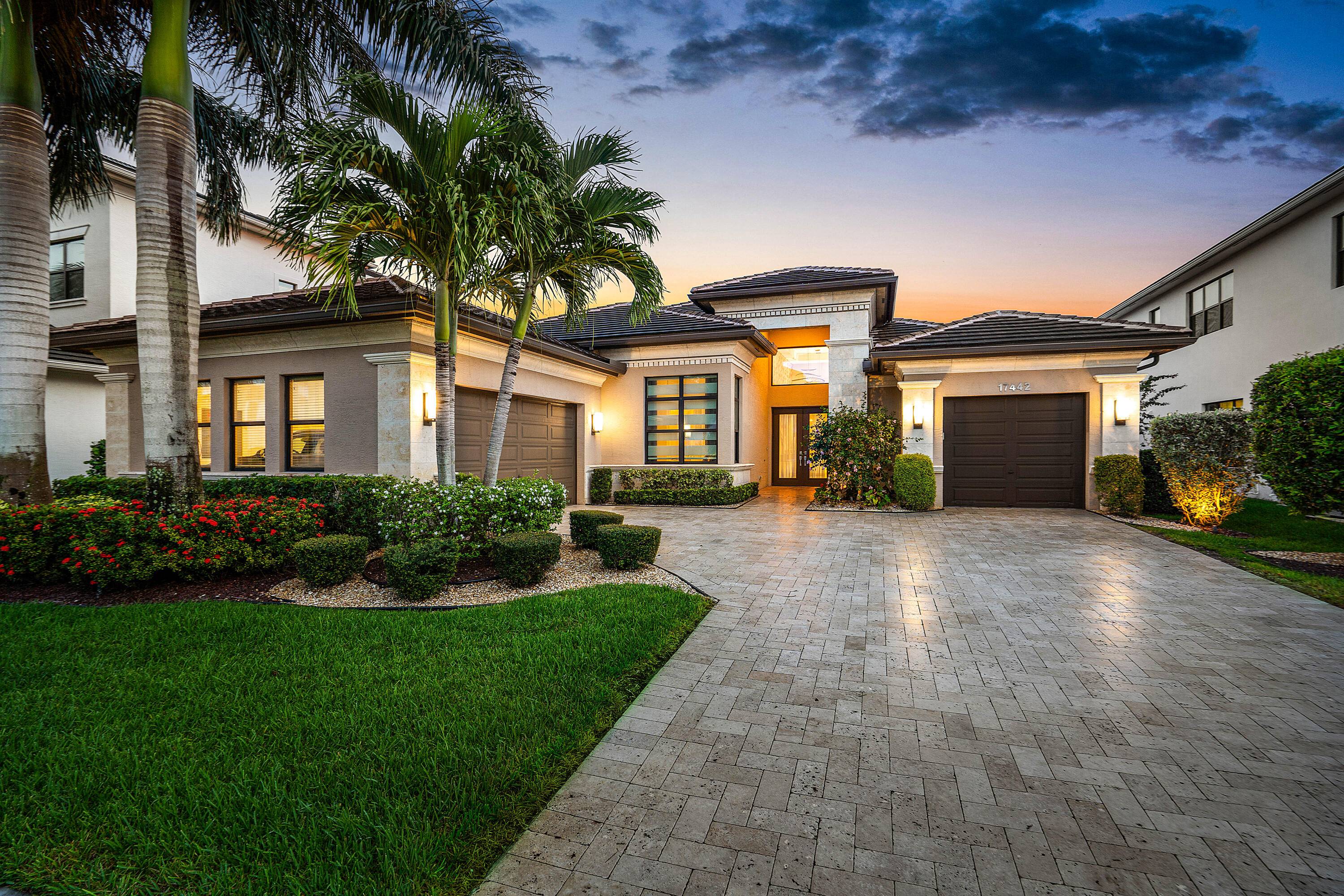 Welcome to 17442 Rosella Rd an exceptional Murano Model from the Coastal Collection, now being offered for the first time in the prestigious Boca Bridges.