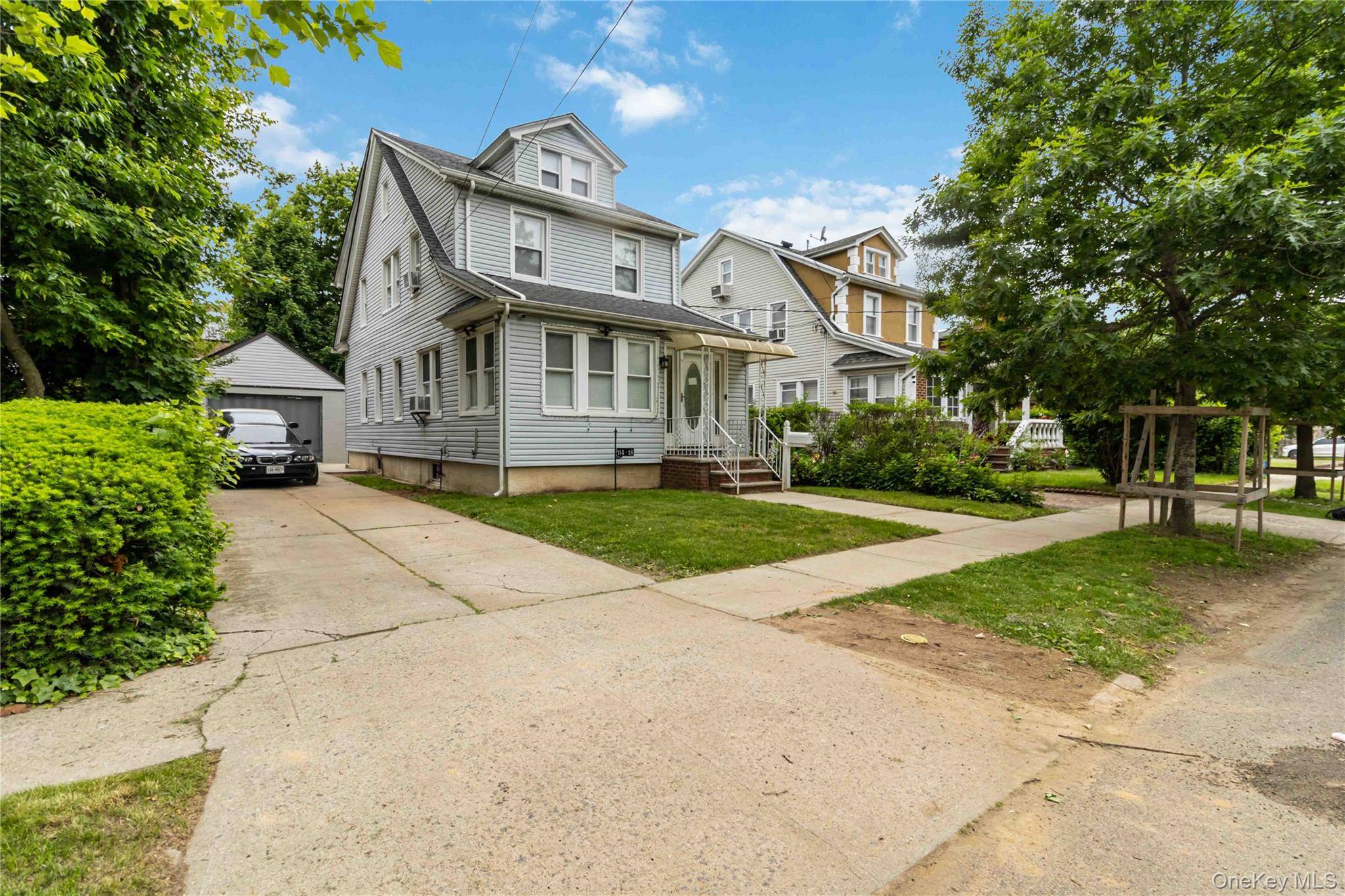Welcome to this beautifully maintained single family home nestled in the heart of Addisleigh Park Step into the inviting enclosed front porch, perfect for morning coffee or evening relaxation.