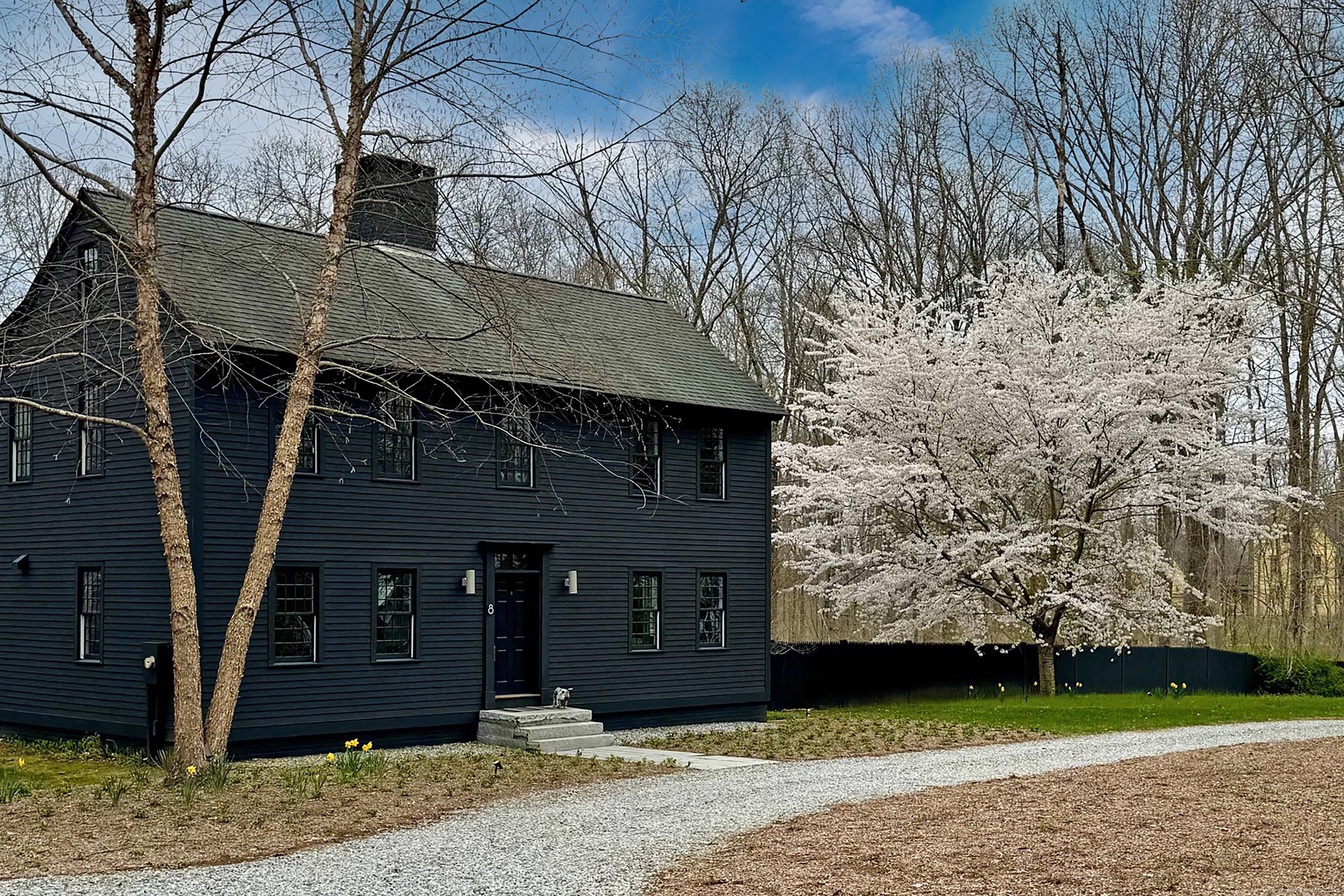 Escape the stress of city life in this beautifully updated Hadlyme Saltbox, nestled on over four peaceful acres just 1.