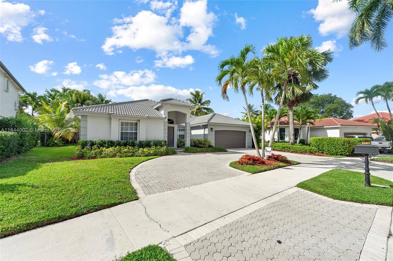 Discover the sought after Covington Five in Jardin at Weston Hills Country Club.
