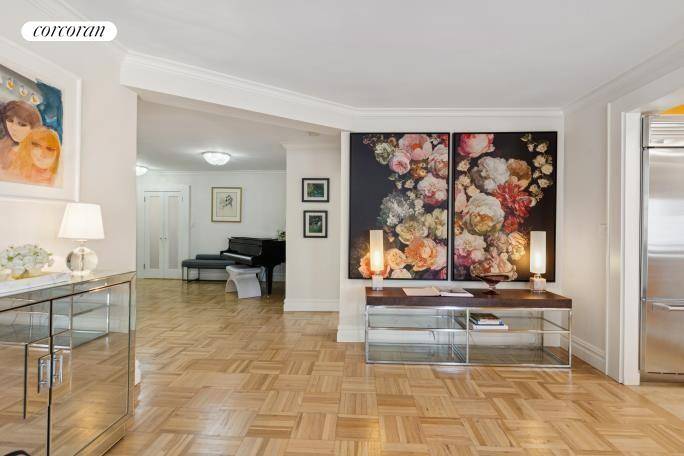 Newly listed, sprawling three bedroom three bath postwar cooperative has a grand entrance foyer that presently, comfortably holds a baby grand piano.