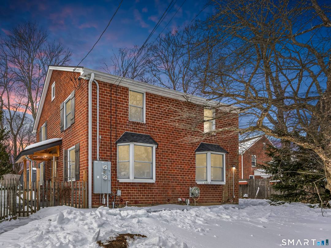 Welcome to 220 Melville Drive in Fairfield, a charming brick half duplex.