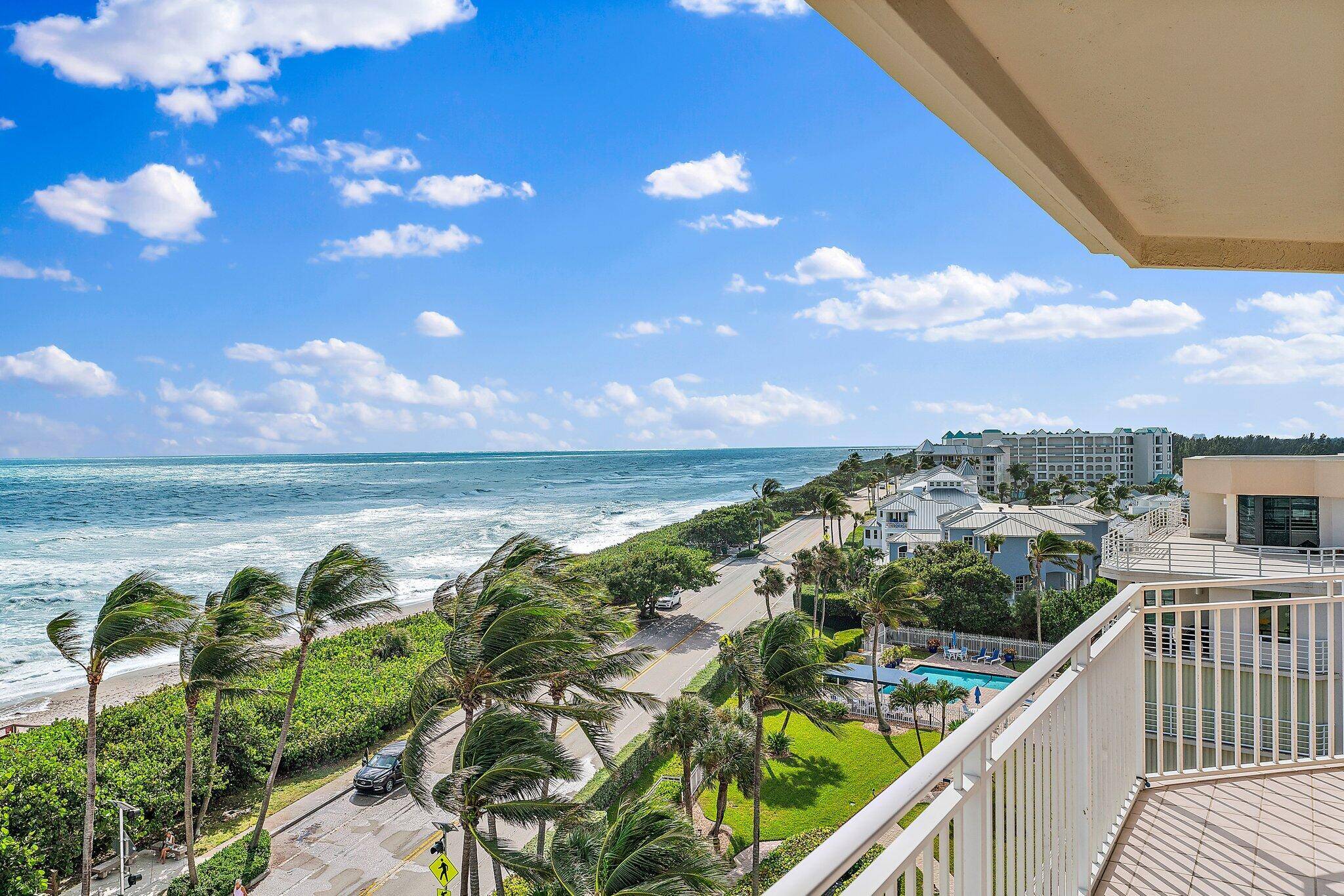 Seasonal oceanfront Penthouse rental with SE exposure looks miles down the beach.