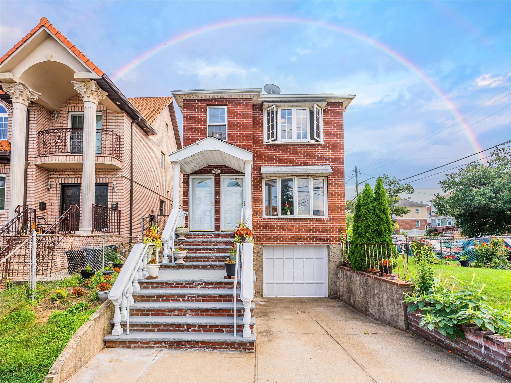 Spacious all brick legal two family Hi Ranch home featuring 3 bedrooms and 1.