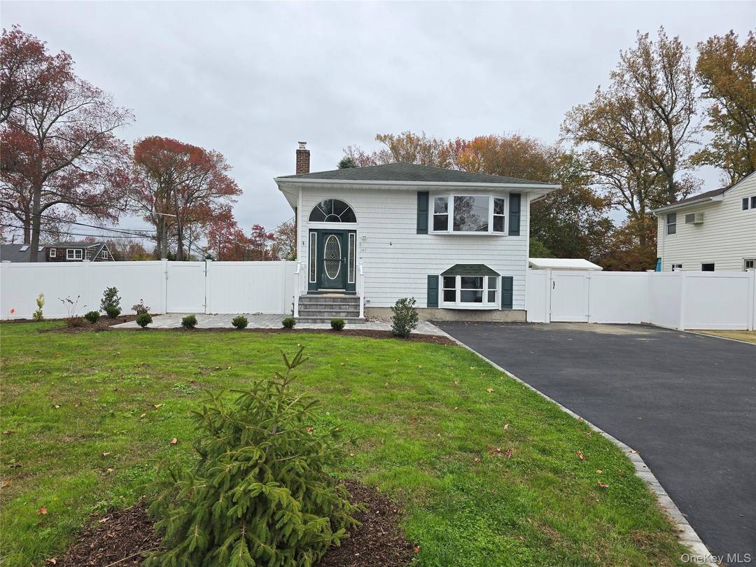 Move in ready, available and beautifully renovated 4 Bedroom, 2 Bath Hi Ranch located South of Montauk in Oakdale.
