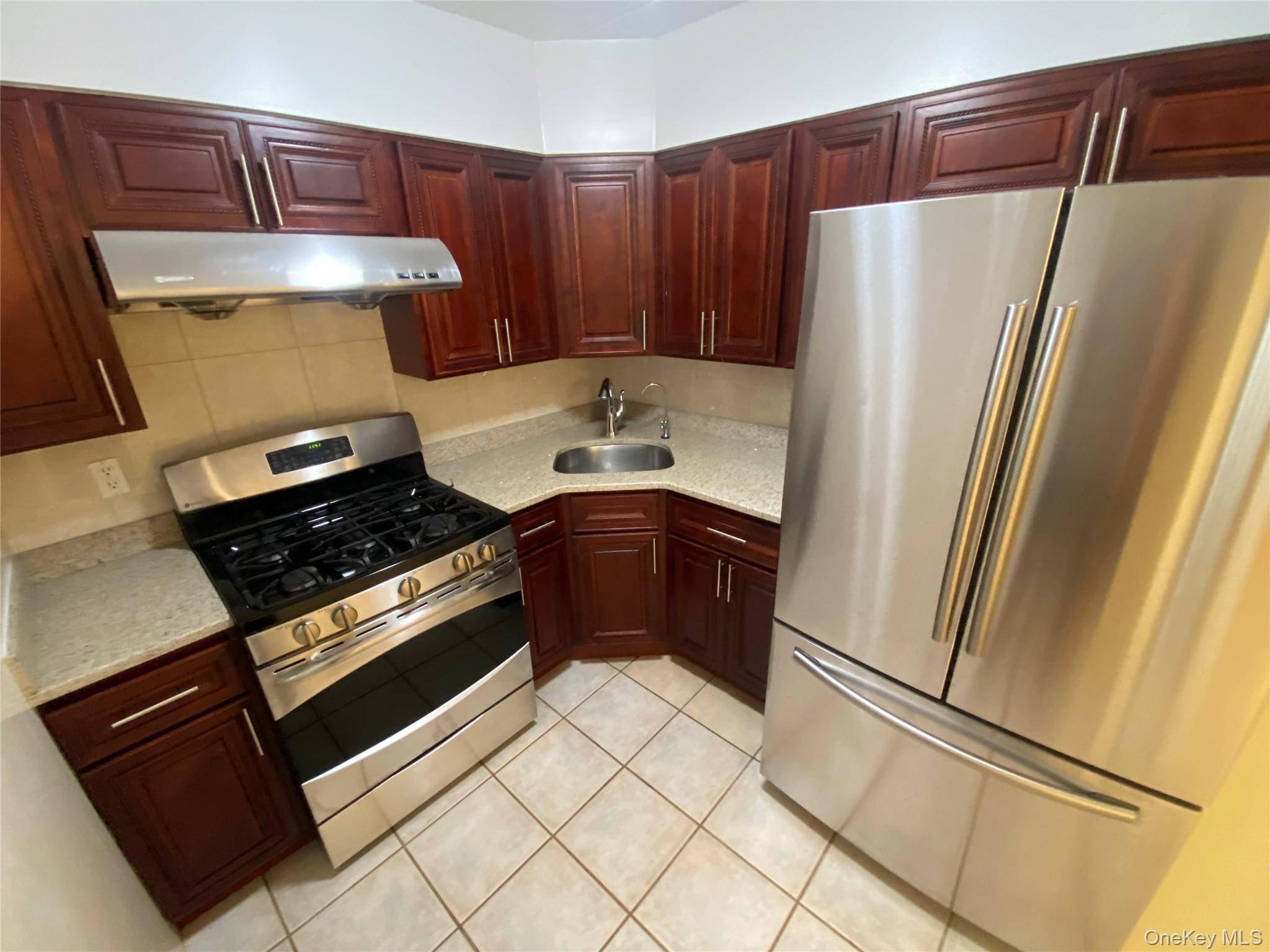 Renovated Kitchen, Excellent Condition, 2 Bedrooms Duplex With Laundry Room, 1 Car Garage With Driveway,.