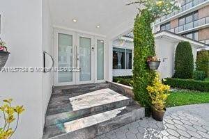 Elegantly reimagined, this 4 bedroom, 3 bathroom residence is tucked in a peaceful cul de sac in prestigious North Coconut Grove.