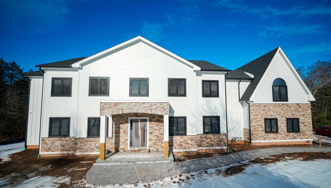 3 Cobtail Way is nestled within the coveted Folly Farms community, where this exceptional new residence showcases refined craftsmanship and modern luxury on a spacious lot.