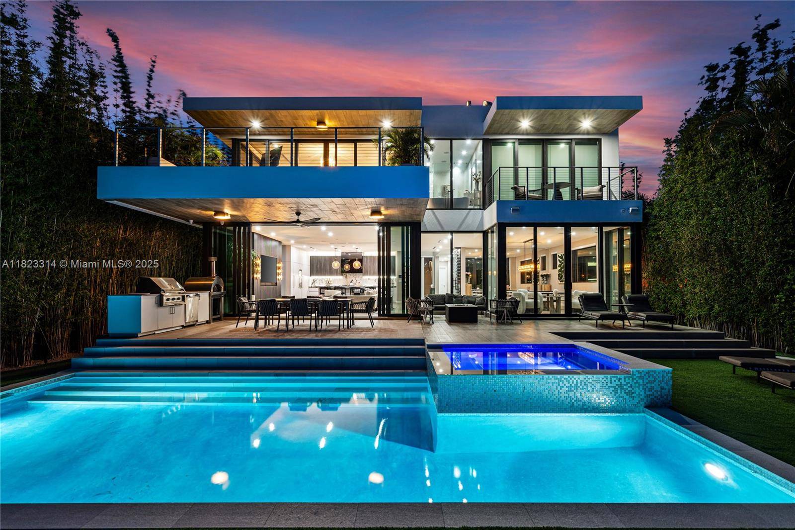 Golfers' paradise ! Contemporary luxurious home nestled on private La Gorce Country Club offering serene golf course views from everywhere !