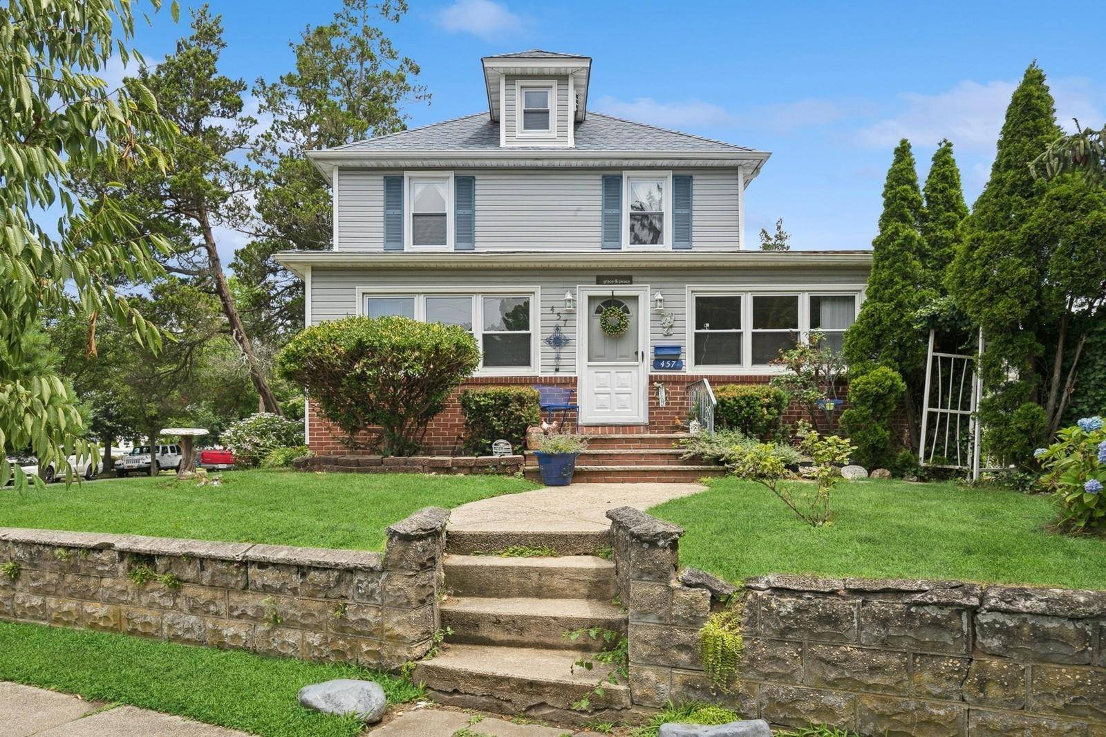 This Grand, Side Hall Colonial, Located in a Quiet Neighborhood of Farmingdale Village, Exudes Timeless Elegance and Vintage Charm.