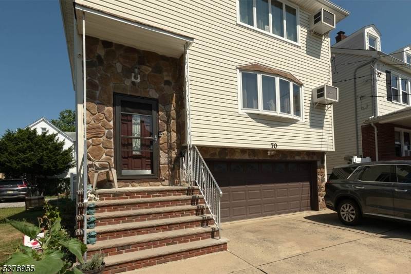 This custom two family home features three levels.