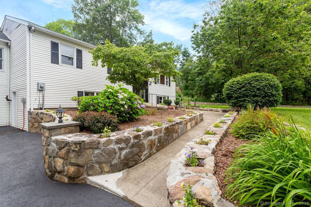 This oversized 5 bedroom, 3 full, 2 half bath home is situated on a quiet cul de sac with a level backyard.