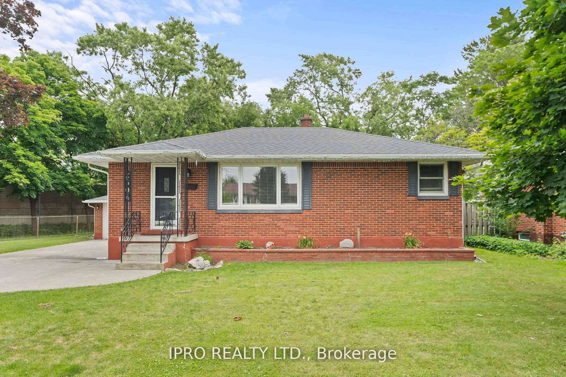 BRIGHT AND WELL DECORATED MAIN FLOOR FEATURES GLEAMING HARDWOOD FLOORS, UPDATED KITCHEN AND BATH, 3 BEDROOMS.