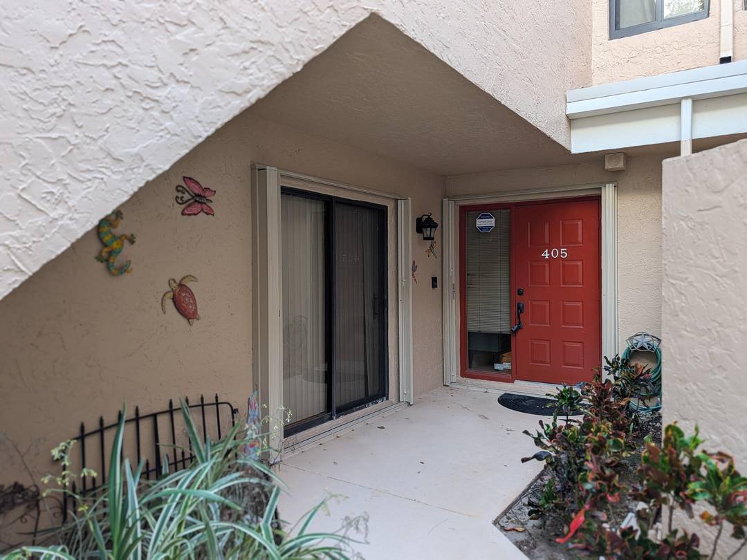Welcome to Fairways 405, your South Florida retreat on the lush 16th hole of the prestigious gated Boca Golf and Tennis Country Club.