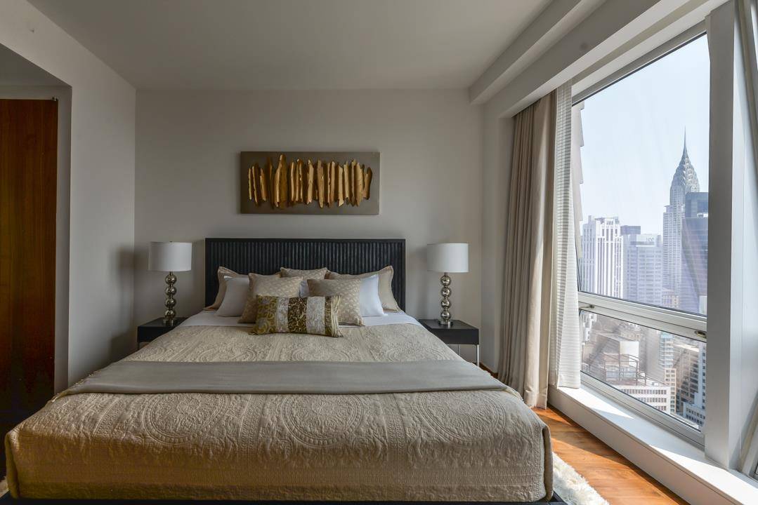 Stunning two bedroom, 1, 168sf 2 full baths and powder room.