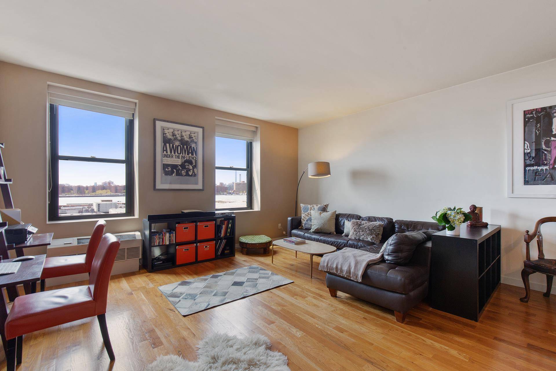 LARGE ONE BEDROOM IN GREENPOINTS VIBRANT WATERFRONT Apartment 4J has a generous living space with an open kitchen that is ideal for entertaining.