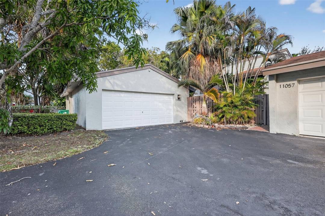 Unique chance to create your own custom 2 story townhouse w 2 car garage and private courtyard in Sabal Chase Great comps same models 11425 and 11410 SW 110th Lane ...
