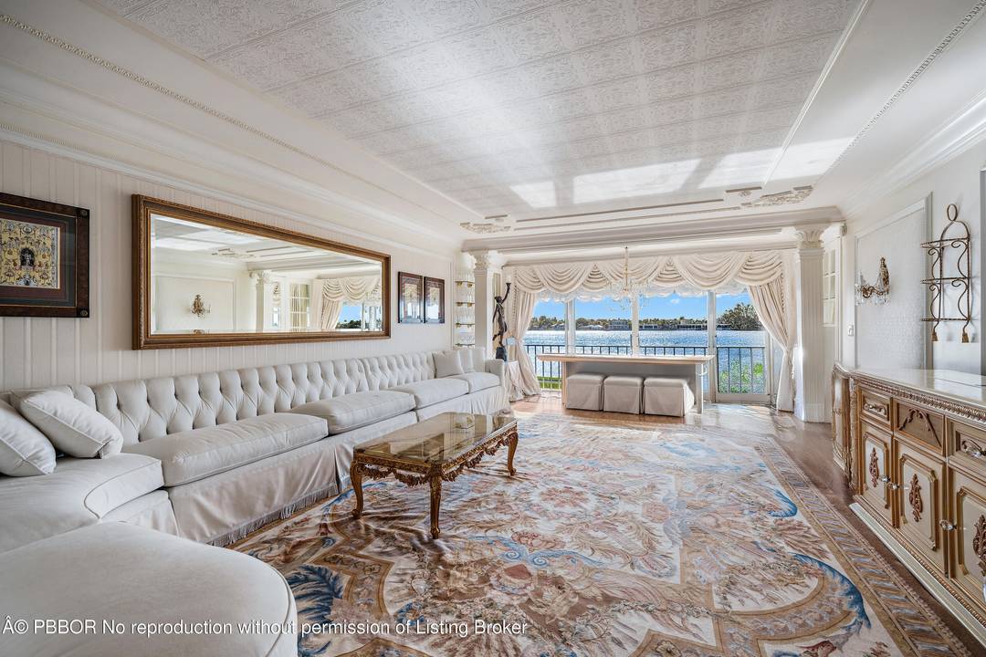 2170 Ibis Isle, Unit 8 offers a refined approach to waterfront living within one of Palm Beach's most charming island enclaves.