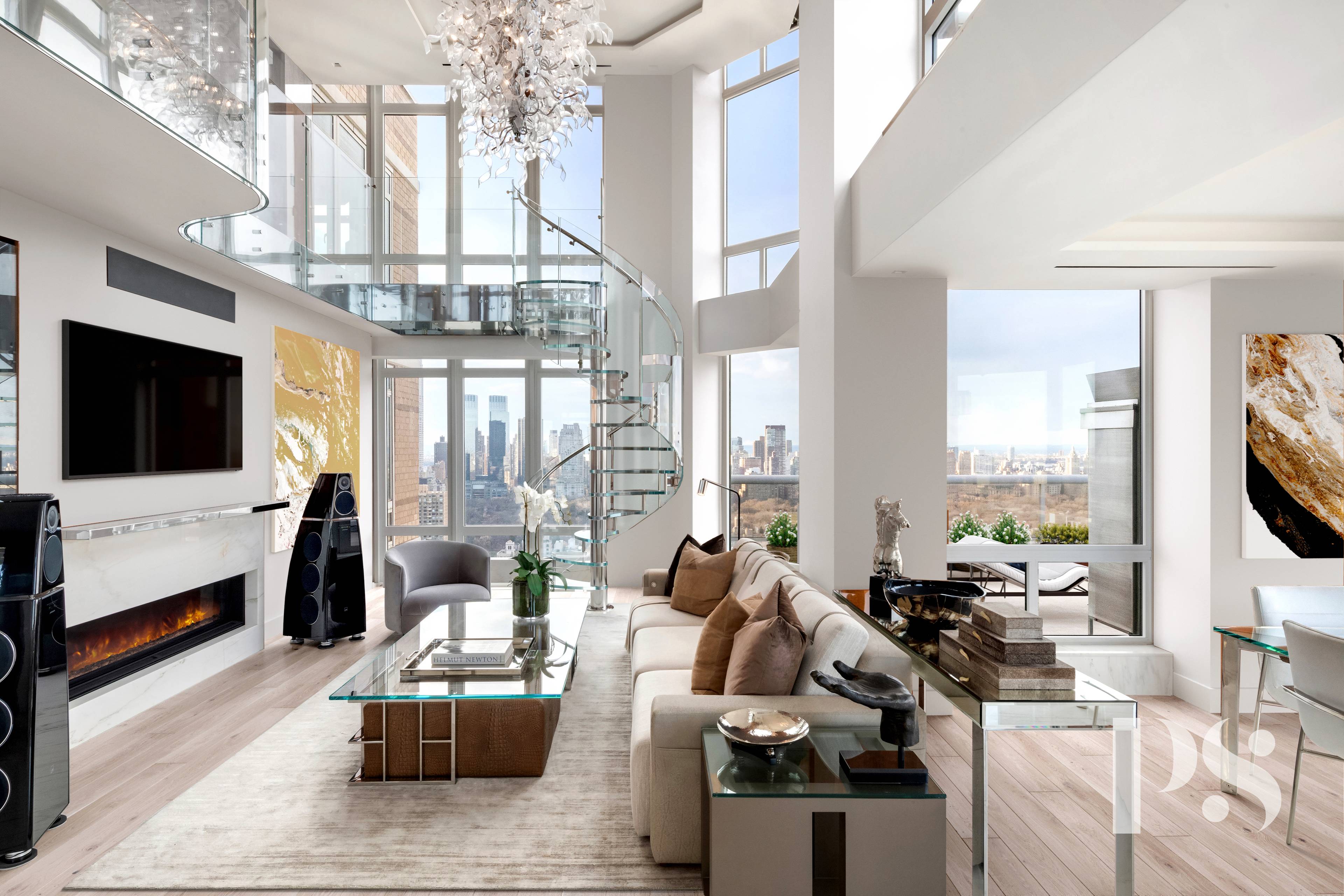 This exceptional private, gut renovated, duplex penthouse with picturesque city, Central Park, and river views is like no other.