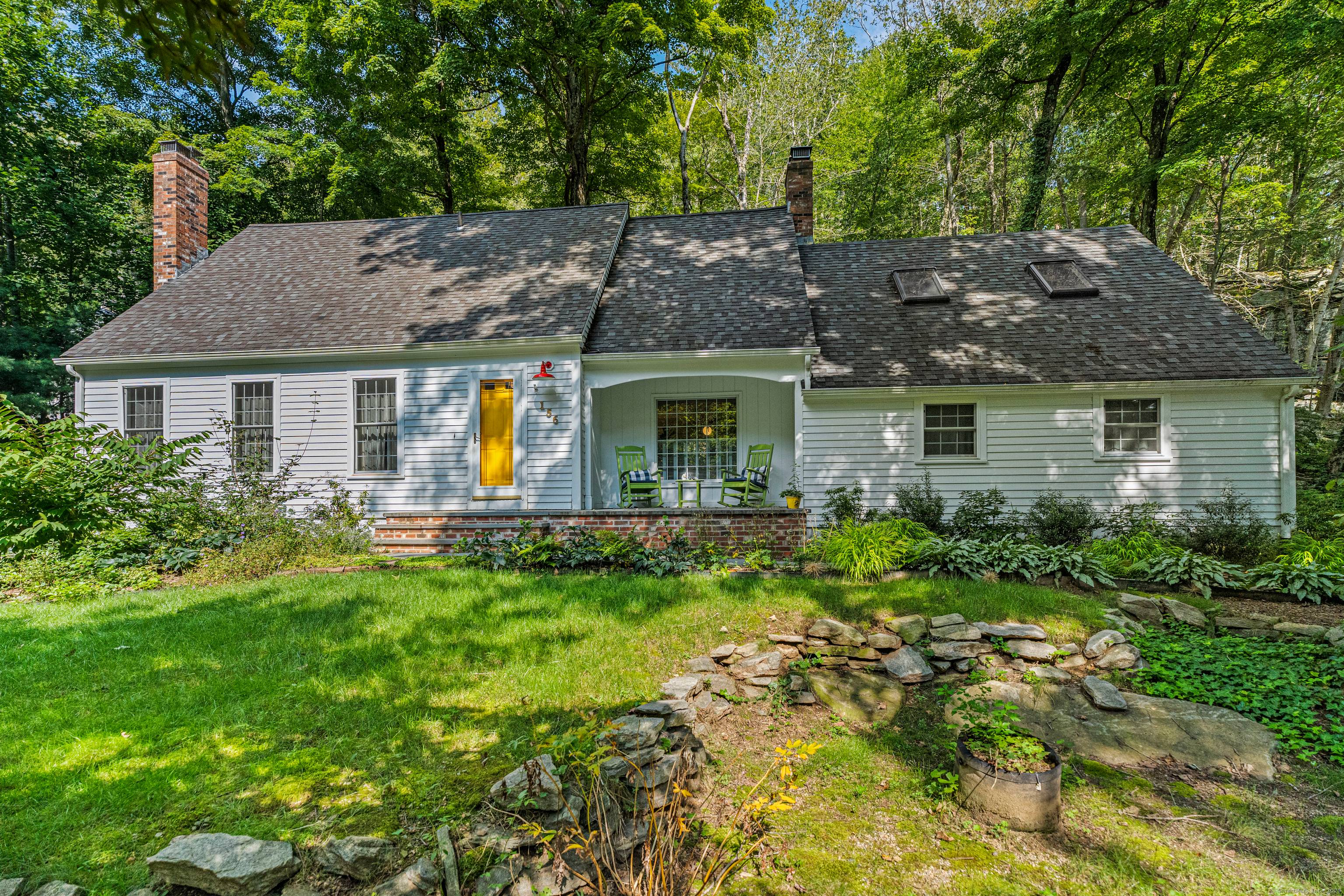 Quintessential New England Cape on over an acre, situated perfectly to enjoy the serene natural beauty of North Madison, while being only minutes from downtown or Madison beaches.