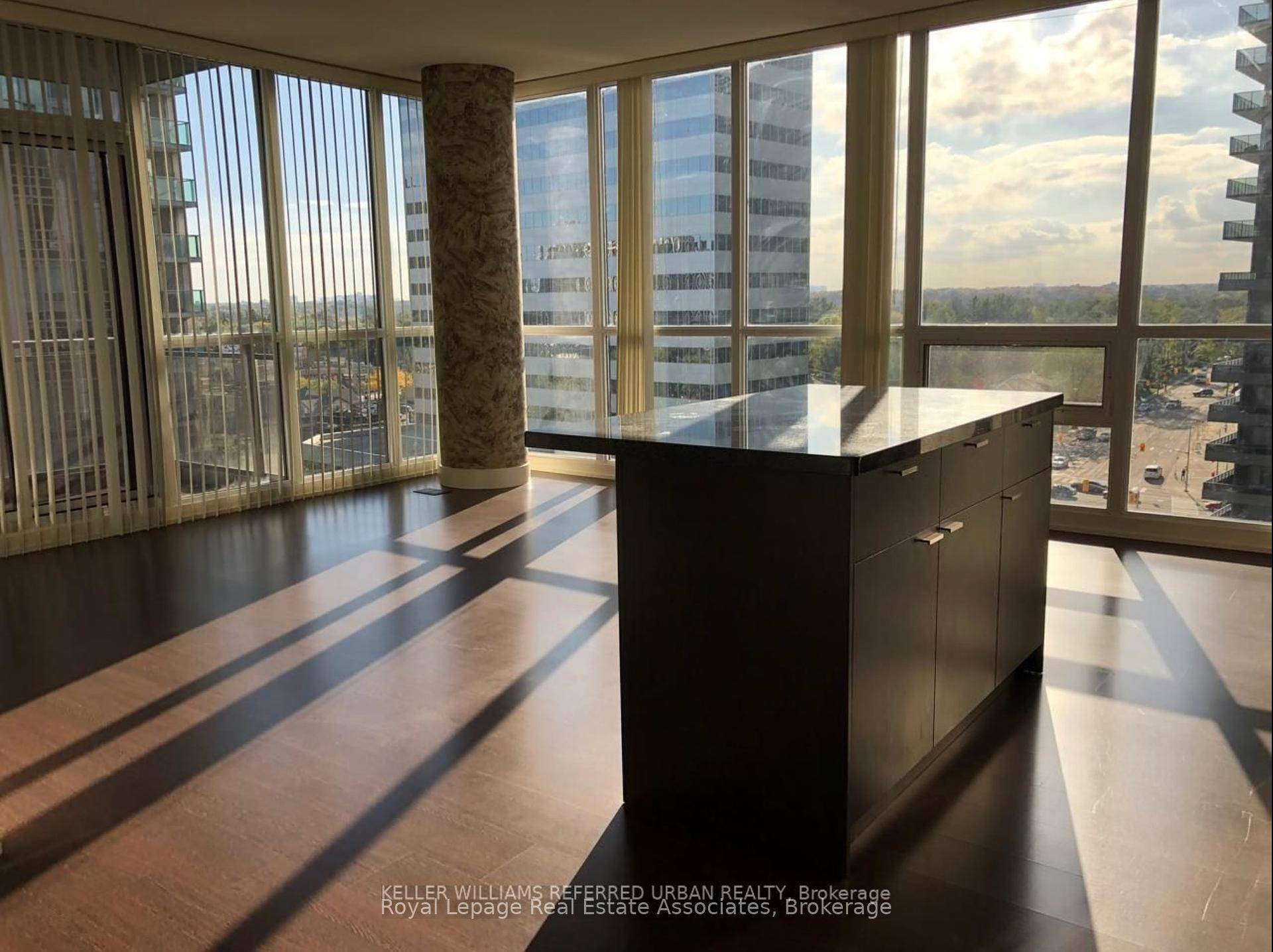 Rare chance to live in a bright and immaculate, south west facing, 2 den corner condo at Minto Gardens.
